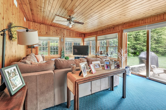 131 Ridgeview Ave, Trumbull, CT 06611 - carpeted living room with lofted ceiling, wood walls, ceiling fan, and wood ceiling