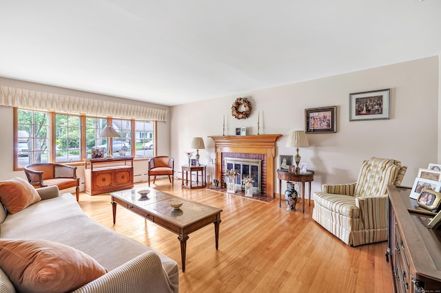 131 Ridgeview Ave, Trumbull, CT 06611 - living area with a fireplace and light wood finished floors