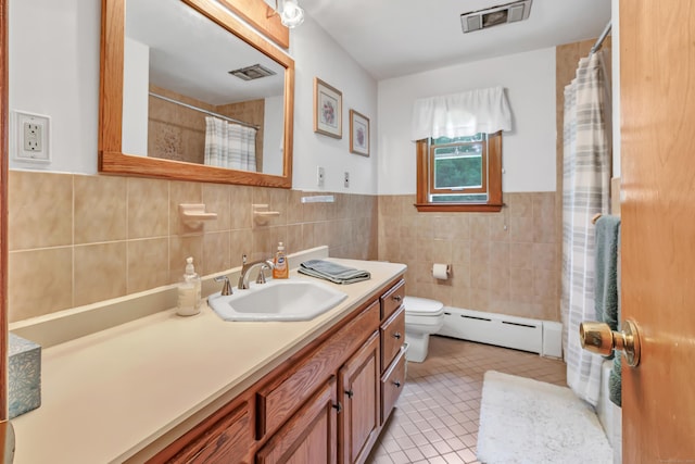 131 Ridgeview Ave, Trumbull, CT 06611 - full bath featuring a baseboard radiator, tile walls, toilet, vanity, and tile patterned flooring