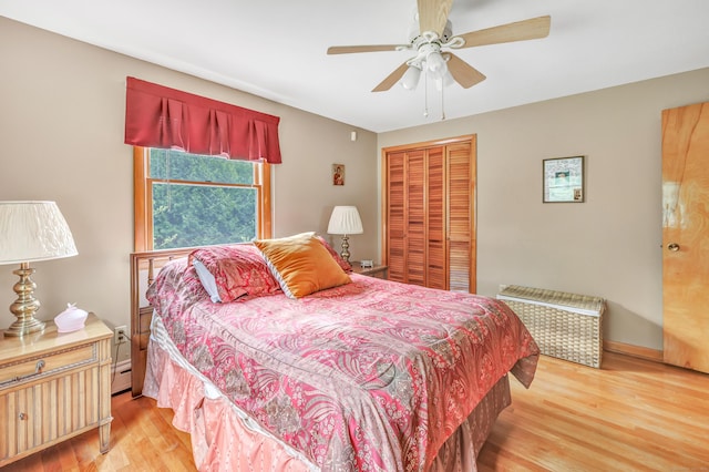 131 Ridgeview Ave, Trumbull, CT 06611 - bedroom with light wood finished floors, a closet, a ceiling fan, and a baseboard heating unit