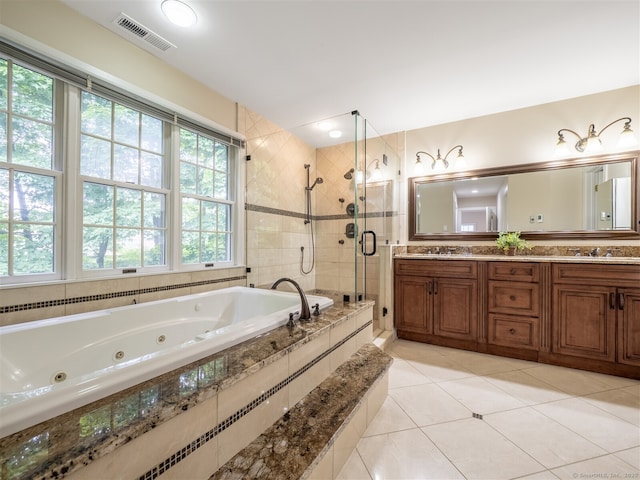 10 Wilton Hls Unit 10, Wilton, CT 06897 - full bath with a shower stall, double vanity, a jetted tub, and tile patterned floors