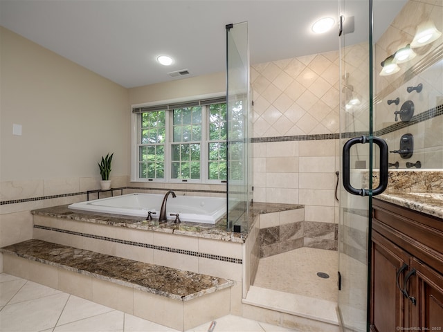 10 Wilton Hls Unit 10, Wilton, CT 06897 - bathroom with a bath, a shower stall, vanity, and tile patterned flooring