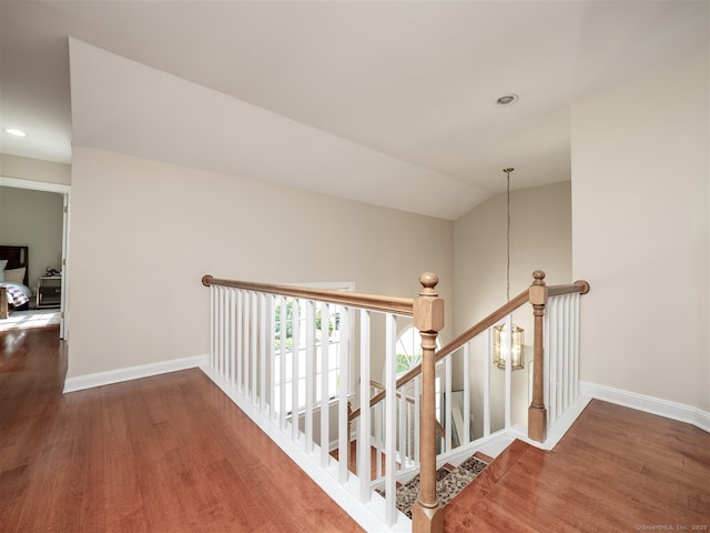 10 Wilton Hls Unit 10, Wilton, CT 06897 - hall featuring baseboards, an upstairs landing, wood finished floors, and recessed lighting