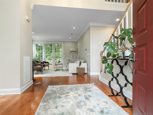 10 Wilton Hls Unit 10, Wilton, CT 06897 - entryway with crown molding, wood finished floors, baseboards, and recessed lighting