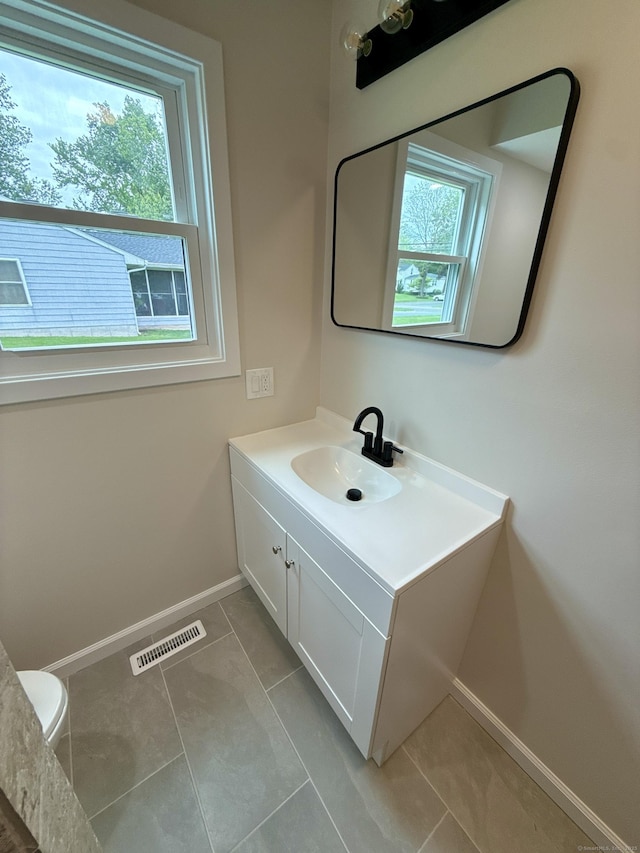 9 Grieb Rd, Wallingford, CT 06492 - bathroom featuring baseboards, vanity, and toilet