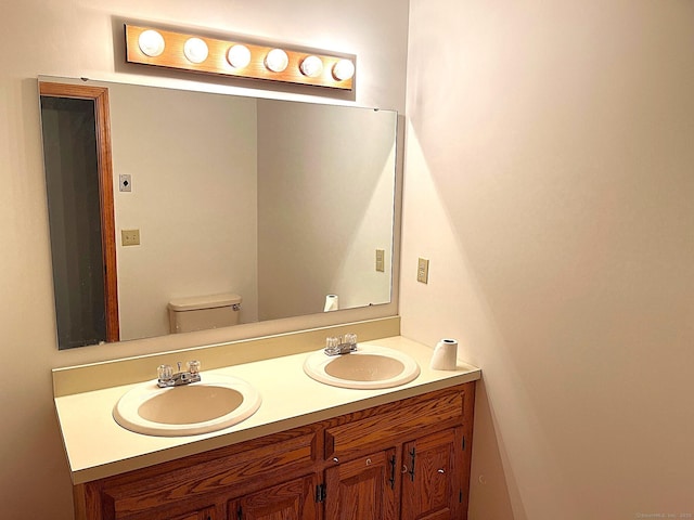 366 Ash St # 31, Windham, CT 06226 - bathroom featuring double vanity and toilet