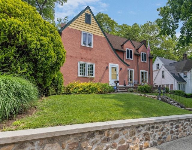 73 Hemlock Rd, New Haven, CT 06515 - tudor house with stucco siding and a front yard