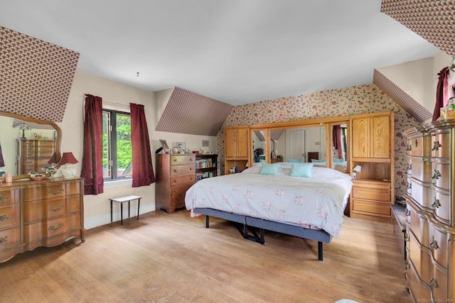 73 Hemlock Rd, New Haven, CT 06515 - bedroom with light wood-style floors and lofted ceiling