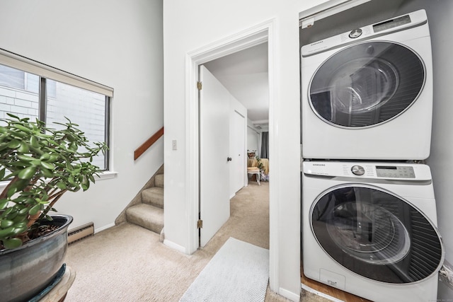 26 Evergreen Rd Unit 26, Torrington, CT 06790 - laundry room with estacked washer and dryer, carpet flooring, baseboard heating, and baseboards