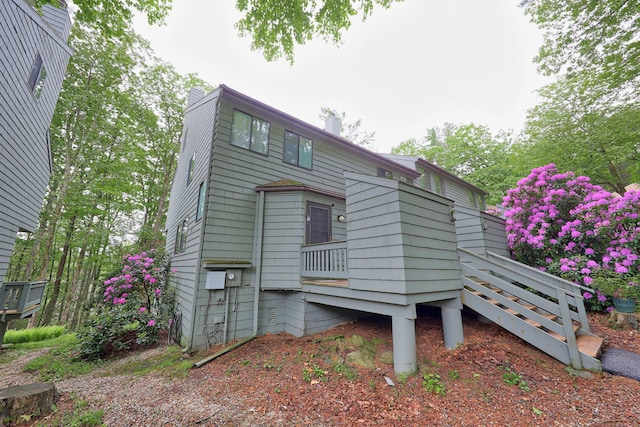 26 Evergreen Rd Unit 26, Torrington, CT 06790 - rear view of house with a chimney