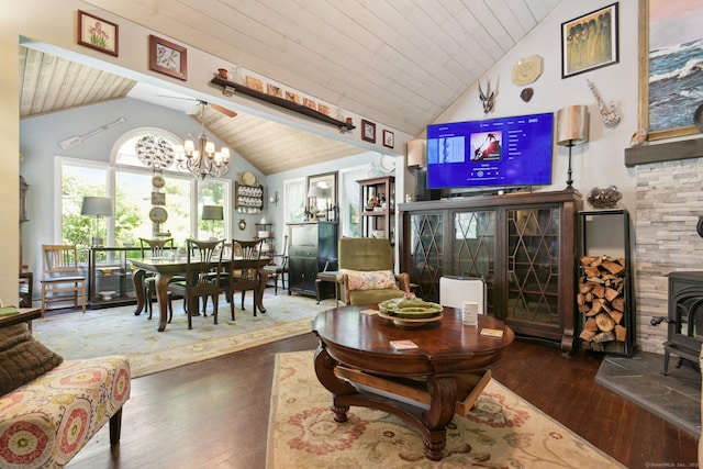 56 Giants Neck Rd, East Lyme, CT 06357 - living area featuring a wood stove, wood-type flooring, a chandelier, high vaulted ceiling, and wooden ceiling