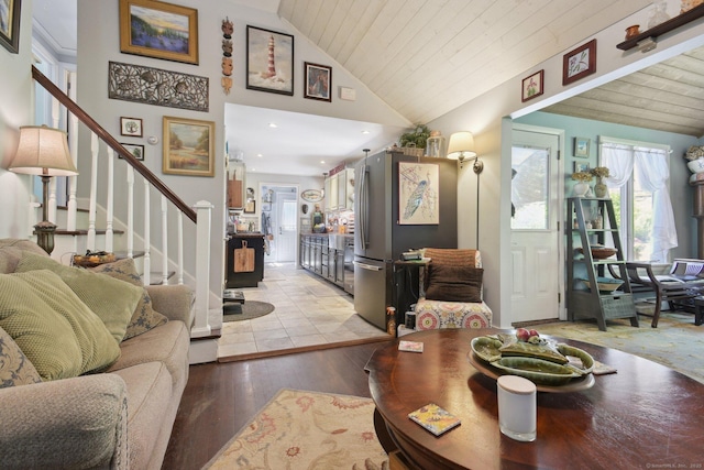 56 Giants Neck Rd, East Lyme, CT 06357 - living room featuring vaulted ceiling, stairs, light wood-type flooring, and wooden ceiling