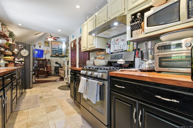 56 Giants Neck Rd, East Lyme, CT 06357 - kitchen featuring stainless steel appliances, wood counters, under cabinet range hood, vaulted ceiling, and a ceiling fan