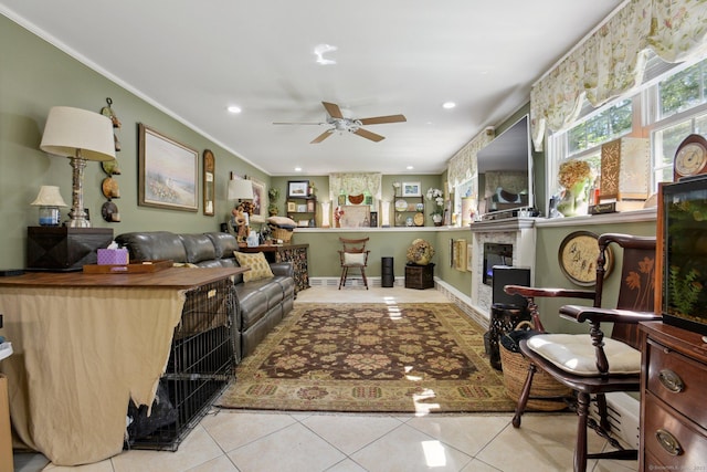 56 Giants Neck Rd, East Lyme, CT 06357 - living room with tile patterned floors, a ceiling fan, crown molding, recessed lighting, and a fireplace