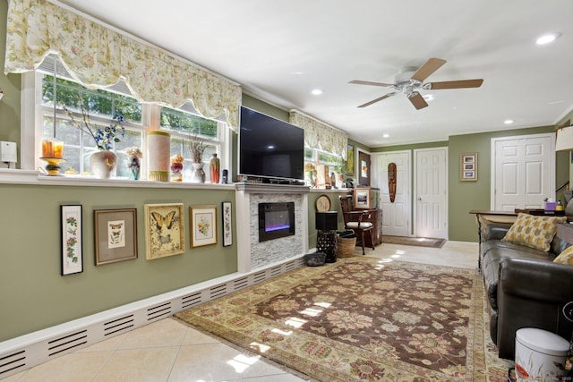 56 Giants Neck Rd, East Lyme, CT 06357 - living area with tile patterned flooring, ceiling fan, recessed lighting, and a stone fireplace