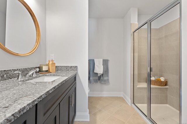 129 Shea Cir Unit 129, Cheshire, CT 06410 - full bath featuring vanity, tile patterned floors, a stall shower, and toilet