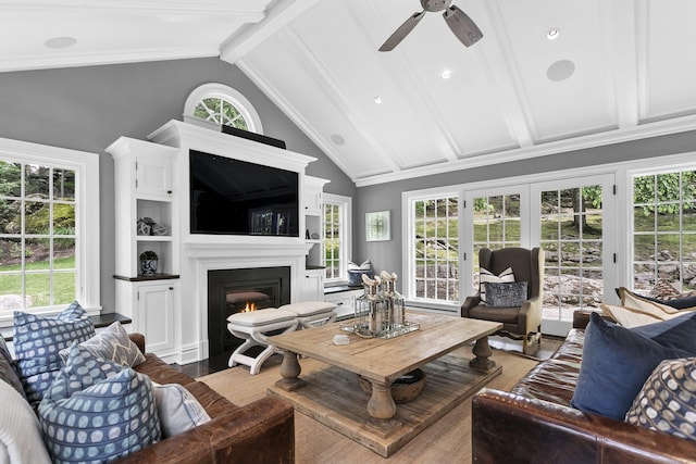 7 Over Rock Ln, Westport, CT 06880 - living room featuring wood finished floors, ceiling fan, a fireplace with flush hearth, and healthy amount of natural light