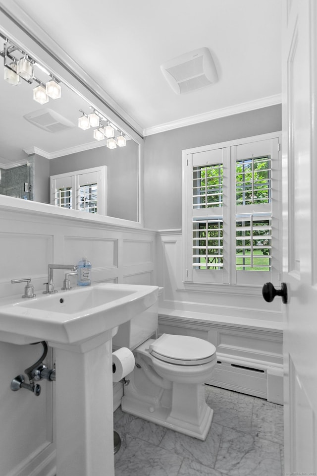7 Over Rock Ln, Westport, CT 06880 - bathroom featuring crown molding, a baseboard heating unit, marble finish flooring, toilet, and a decorative wall
