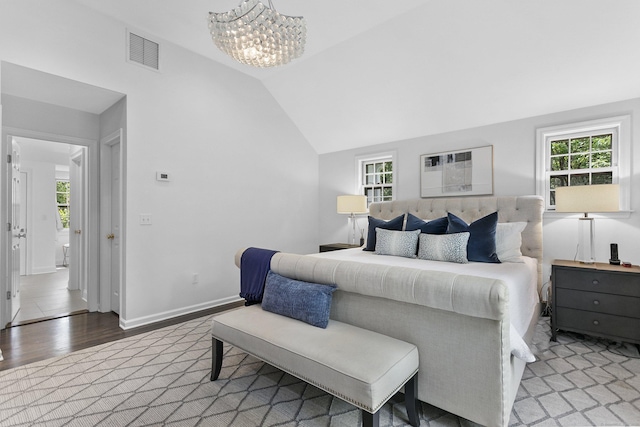 7 Over Rock Ln, Westport, CT 06880 - bedroom featuring wood finished floors, lofted ceiling, a chandelier, and baseboards