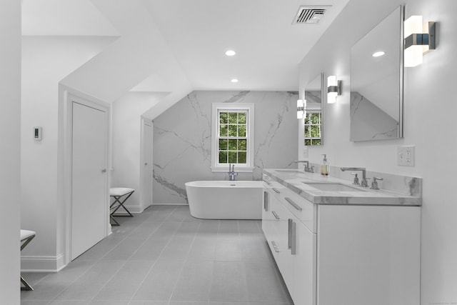 7 Over Rock Ln, Westport, CT 06880 - full bathroom featuring double vanity, recessed lighting, a freestanding tub, and baseboards