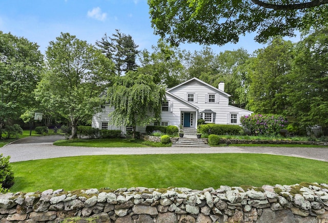 7 Over Rock Ln, Westport, CT 06880 - view of front facade featuring a chimney and a front lawn