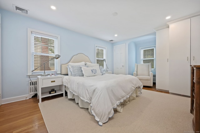 161 Crestwood Rd, Fairfield, CT 06824 - bedroom featuring multiple closets, wood finished floors, multiple windows, recessed lighting, and baseboards