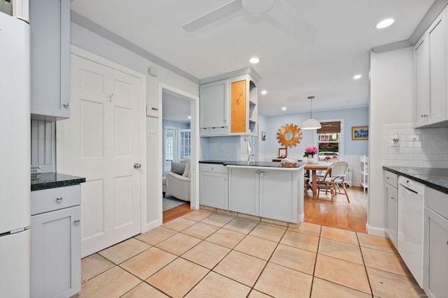 161 Crestwood Rd, Fairfield, CT 06824 - kitchen with white appliances, plenty of natural light, decorative light fixtures, ceiling fan, and recessed lighting
