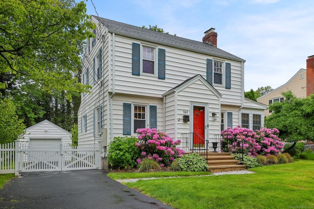 161 Crestwood Rd, Fairfield, CT 06824 - colonial inspired home featuring a gate, a garage, an outbuilding, and a chimney
