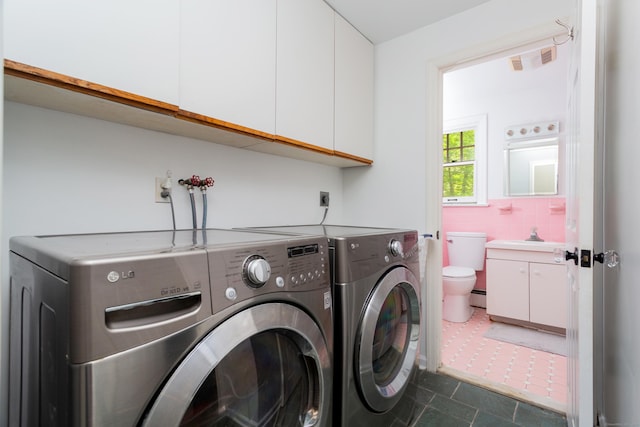 21 Forest Rd, Weston, CT 06883 - laundry area featuring cabinet space, washing machine and dryer, and a baseboard radiator