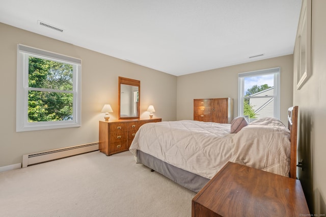 31 S Meadow Ln, Enfield, CT 06082 - carpeted bedroom with a baseboard radiator