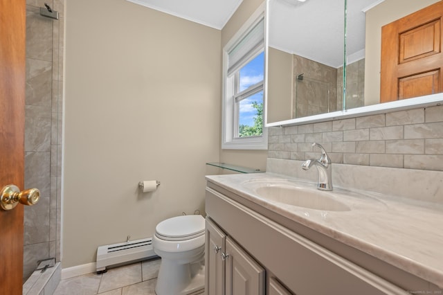 31 S Meadow Ln, Enfield, CT 06082 - bathroom featuring a baseboard radiator, vanity, toilet, tile patterned floors, and baseboards