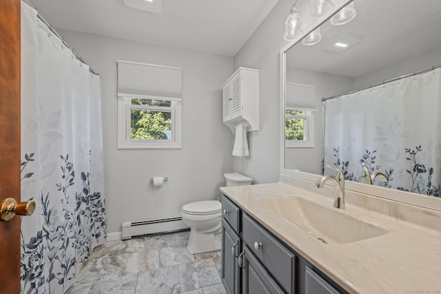 31 S Meadow Ln, Enfield, CT 06082 - bathroom featuring a baseboard heating unit, vanity, healthy amount of natural light, and toilet
