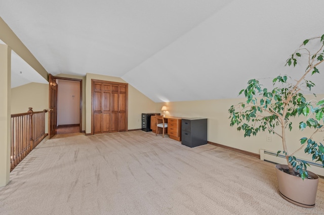 31 S Meadow Ln, Enfield, CT 06082 - bonus room with vaulted ceiling, light colored carpet, baseboards, and a baseboard heating unit