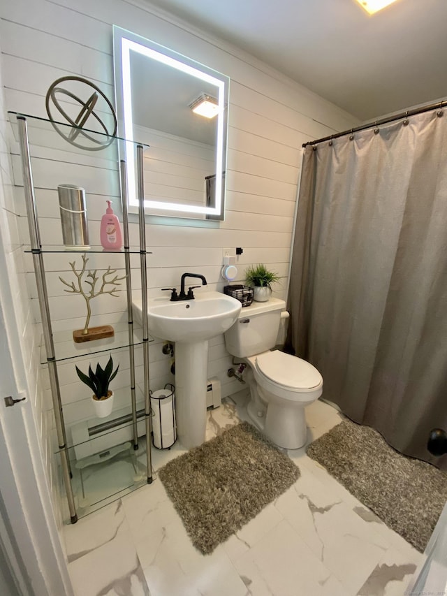 455 Middletown Ave, Wethersfield, CT 06109 - full bathroom featuring marble look tile flooring, toilet, wooden walls, a shower with shower curtain, and a baseboard heating unit