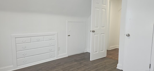 265 Harlem Ave, Bridgeport, CT 06606 - unfurnished bedroom featuring dark wood-type flooring and baseboards