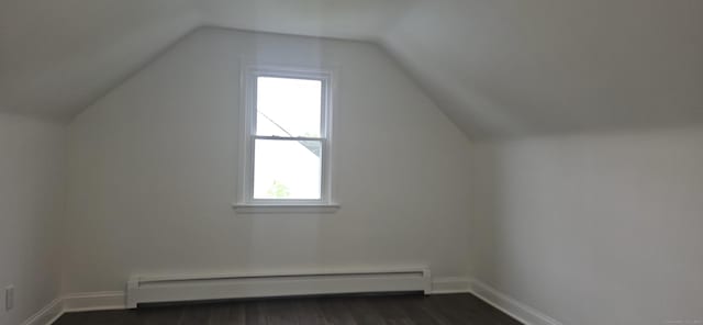 265 Harlem Ave, Bridgeport, CT 06606 - bonus room with a baseboard radiator, healthy amount of natural light, dark wood-style floors, baseboards, and lofted ceiling