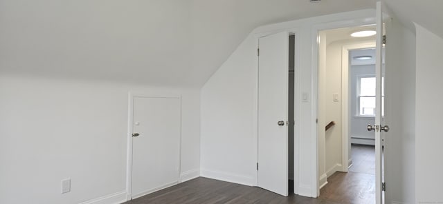 265 Harlem Ave, Bridgeport, CT 06606 - bonus room with baseboard heating, dark wood-style floors, and baseboards