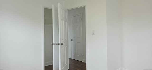 265 Harlem Ave, Bridgeport, CT 06606 - hall featuring dark wood-style floors and baseboards