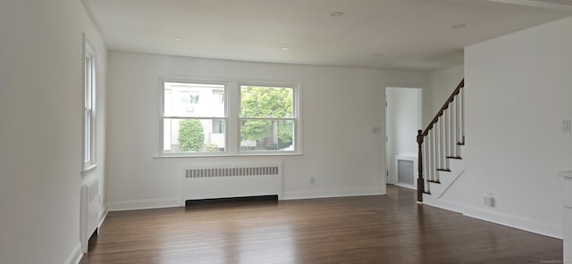 265 Harlem Ave, Bridgeport, CT 06606 - spare room featuring radiator, dark wood-style flooring, stairway, baseboards, and recessed lighting