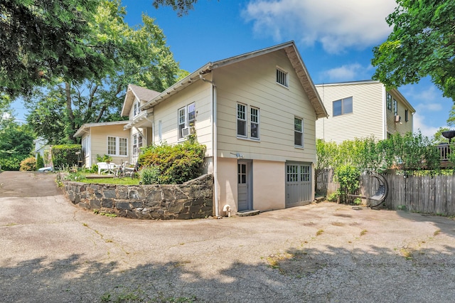 15 Dartley St, Stamford, CT 06905 - back of house with stucco siding
