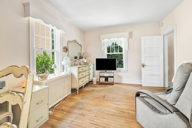 15 Dartley St, Stamford, CT 06905 - living room with plenty of natural light, light wood-type flooring, and baseboards