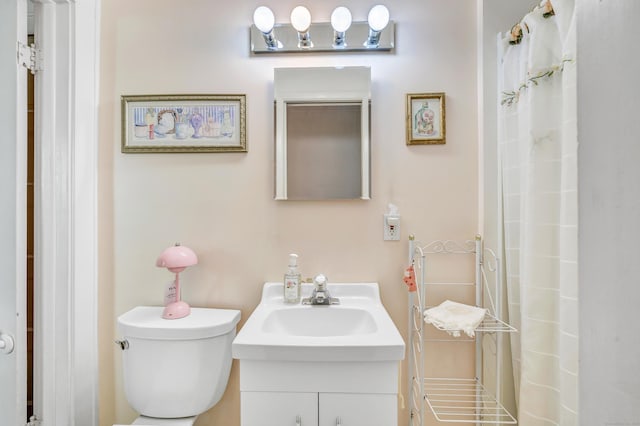 15 Dartley St, Stamford, CT 06905 - bathroom featuring toilet, vanity, and a shower with shower curtain