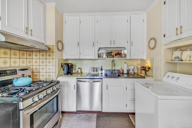 15 Dartley St, Stamford, CT 06905 - kitchen with washer / dryer, appliances with stainless steel finishes, a sink, and white cabinets