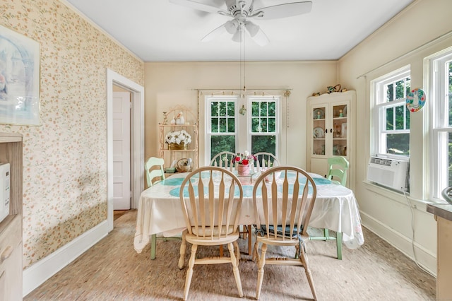 15 Dartley St, Stamford, CT 06905 - dining area featuring wood finished floors, baseboards, a ceiling fan, wallpapered walls, and cooling unit