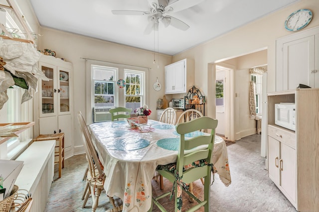 15 Dartley St, Stamford, CT 06905 - dining area with a ceiling fan and baseboards