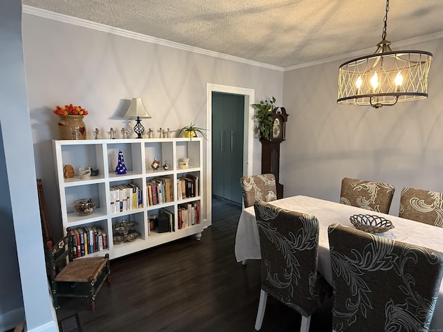 39 Swain Ave, Meriden, CT 06450 - dining space with a chandelier, a textured ceiling, dark wood-type flooring, and crown molding
