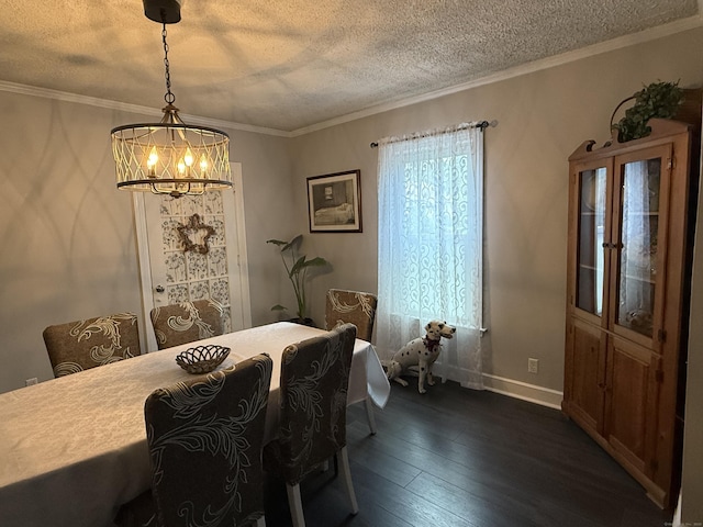 39 Swain Ave, Meriden, CT 06450 - dining area with a chandelier, a textured ceiling, dark wood finished floors, baseboards, and crown molding