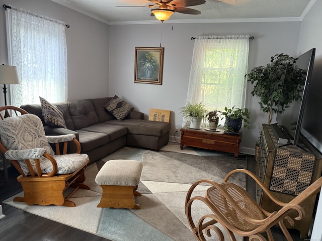 39 Swain Ave, Meriden, CT 06450 - living room featuring ceiling fan and crown molding