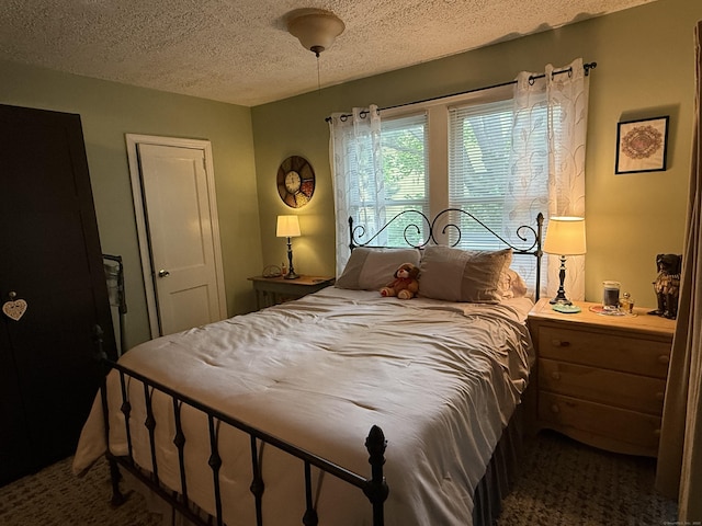 39 Swain Ave, Meriden, CT 06450 - bedroom with dark colored carpet and a textured ceiling
