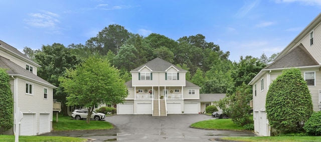 2 Turtle Spring Ln Unit 2, Newtown, CT 06470 - view of front of property featuring driveway and a garage